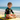 6-8 year old boy on surfboard in Play Robo rash guard