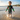 6-8 year old boy splashing in water in Play Robo rash guard