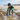 6-8 year old Hispanic boy exploring tide pools in Play Robo rash guard
