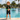 6-8 year old red-haired boy at pool edge in Play Robo rash guard