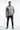 All-over print tee with tattooed model, one hand in pocket