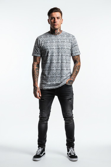 All-over print tee with tattooed model, one hand in pocket