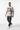 Ash grey tee mid-step walking