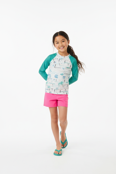 Asian girl in board shorts