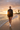 Asian model — black shorts, sunset shoreline