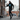 Black male model in black Surfxion hoodie with joggers