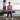 Blonde boy in Independence Match tee near lighthouse