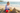 Boy at beach building sandcastle