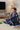 Boy gaming wrapped in blanket