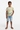 Boy in denim shorts