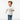 Boy in white tee running