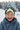Boy laughing in wilderness beanie