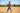 Boy playing catch at baseball field