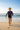 Boy Running with Boogie Board
