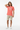 Coral pink tee casual pose