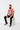 Coral pink tee sitting on cube