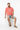 Coral pink tee sitting on cube