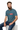Deep teal t-shirt sitting on cube