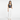 East Asian model with white wide-leg pants