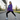 Female model in purple hoodie outdoors
