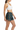 Female side white sports bra