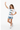 Girl age 7 standing waving friendly