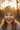 Girl age 7 wearing dinosaur beanie
