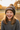 Girl age 7 wearing grey and black beanie