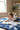 Girl drawing on blanket