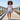 Girl in Never Ending Adventures tee on boardwalk