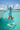 Girl Jumping into Ocean