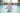 Girl splashing in pool