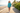 Girl walking on boardwalk