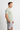Grid Pulse Tee with grey board shorts side view