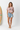 Hazy pink crop top with one hand in pocket