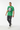 Heather green tee mid-step walking