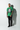Heather green tee with tattoos leaning