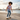 Hispanic boy skateboarding in Independence Match tee