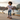 Hispanic boy skateboarding in Never Ending Adventures tee
