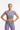 Model 2 - Front view of rainbow palm crop tee