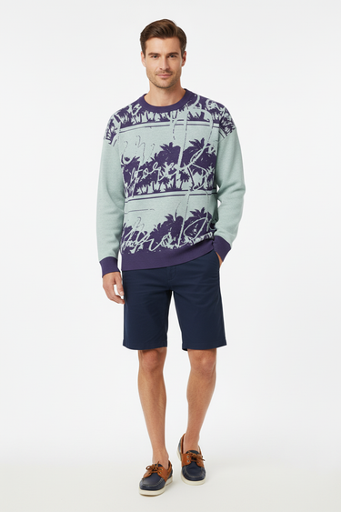 Tropical palm sweater with navy shorts for summer coastal style