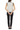 Back view of tropical vest with dark trousers in minimalist setting