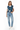 Tropical palm vest styled casually with light wash denim and white sneakers