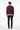 Back view of distressed texture sweater with dark chinos