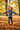 Girl wearing LITTLEcHAPS Space Explorer hoodie jumping in leaves