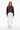 Geometric hearts sweater with white jeans for fresh contemporary style