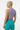 Model 2 - Back view of rainbow palm crop tee