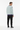 Back view of sweater styled with black joggers