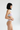 Model 4 - Side view of pastel tie-dye bandeau bikini