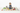 Toddler with stuffed animals on alphabet blanket white background
